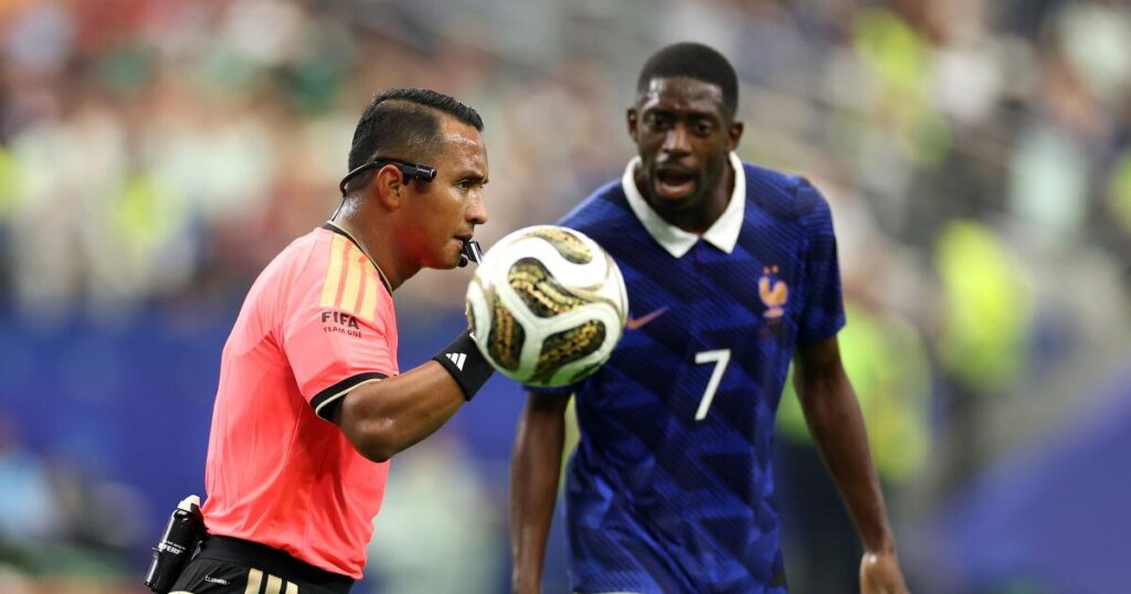 A World Cup referee shares his view of red cards, hydration breaks and soccer history