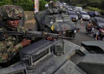 Colombia’s president to take office, vowing hard line against armed groups