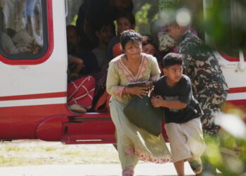 Death toll rises in Nepal-China border disaster as a lake poses new flood threat