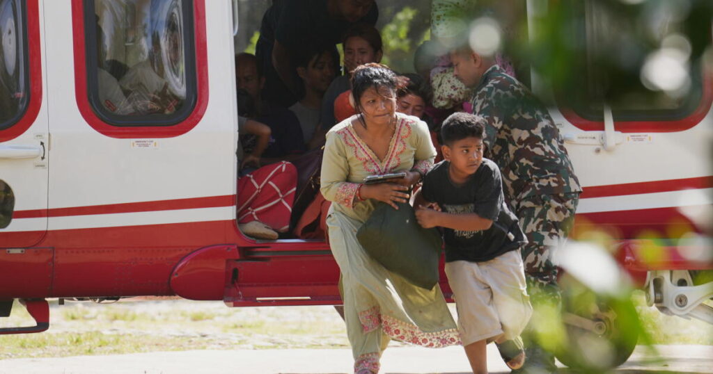 Death toll rises in Nepal-China border disaster as a lake poses new flood threat