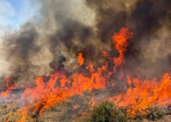 Helicopter battling Utah wildfire crashes, no word on the two aboard