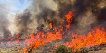 Helicopter battling Utah wildfire crashes, no word on the two aboard