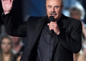 Dr. Phil’s longtime publicist is suing him over claims of wrongful termination and discrimination