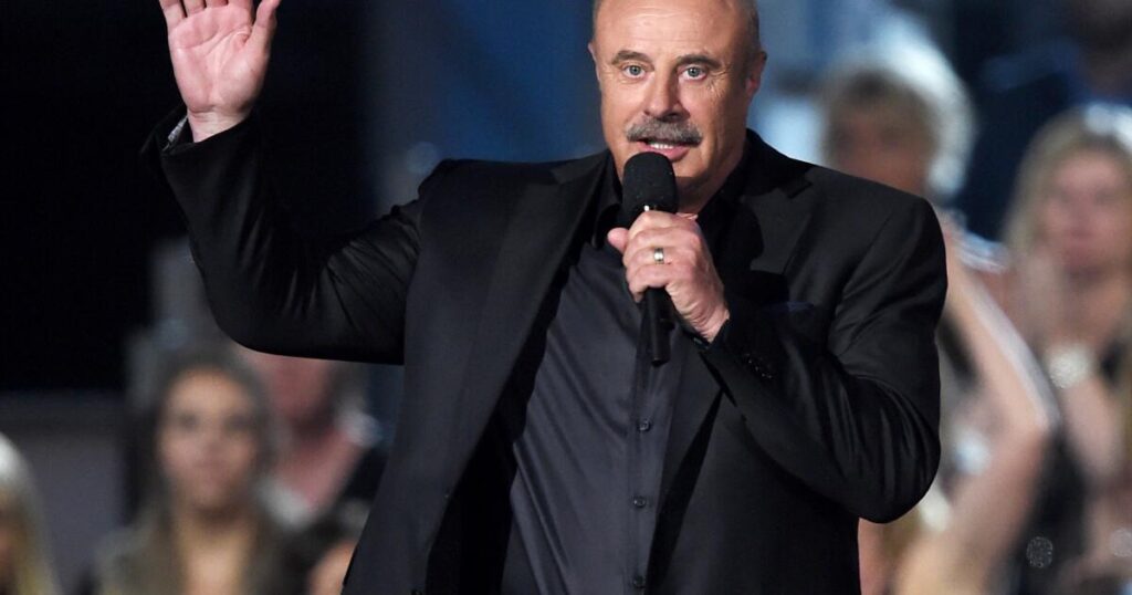Dr. Phil’s longtime publicist is suing him over claims of wrongful termination and discrimination