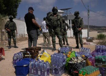 Palestinians besieged in West Bank village fear Israeli settlers will seize their homes