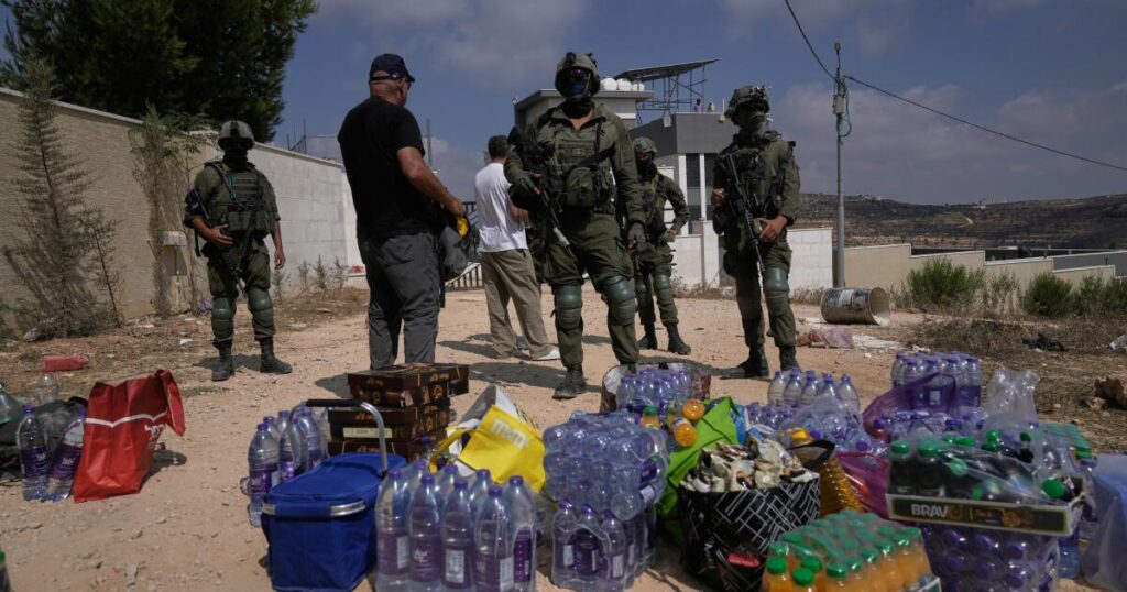 Palestinians besieged in West Bank village fear Israeli settlers will seize their homes