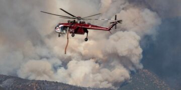 Dangerous wildfire keeps crews from reaching helicopter crash in Utah