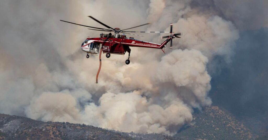 Dangerous wildfire keeps crews from reaching helicopter crash in Utah