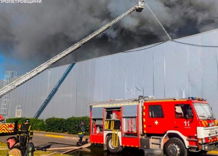 Russian drones kill 14 people at a shopping mall in a central Ukrainian city, officials say