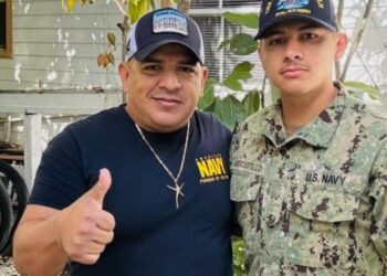 Awaiting return of his son aboard the USS Lincoln, a father is arrested