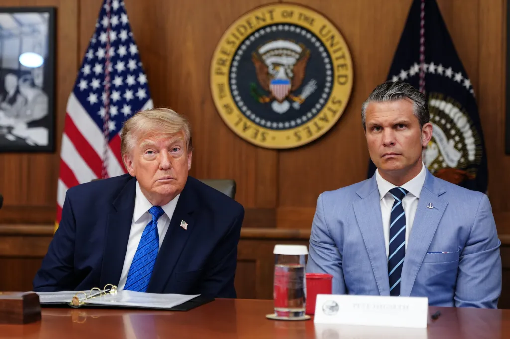 President Trump and Secretary of War Pete Hegseth listen to questions from the press during a Cabinet meeting on Friday, July 31, 2026, at Camp David in Maryland.