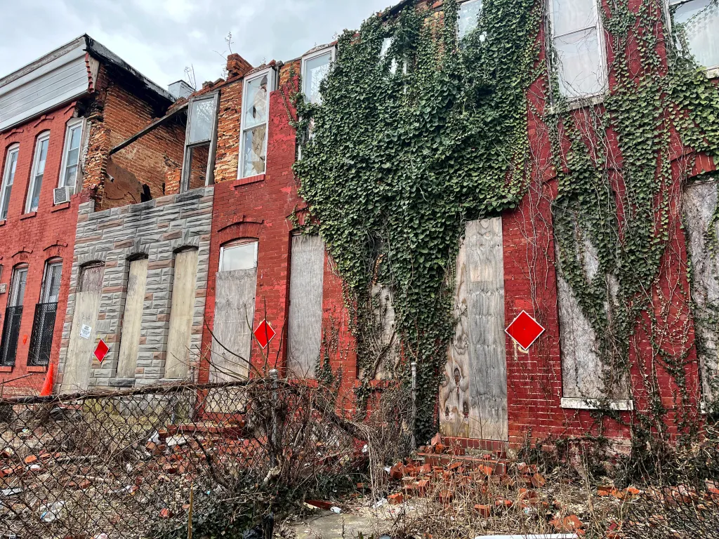Now, row houses are the apples of investors' eyes, who can rehab them significantly and flip them to families looking to save.