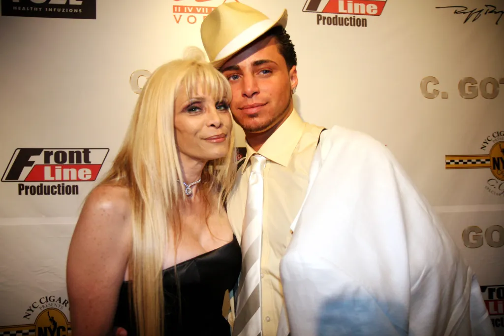 Victoria Gotti, left, and Carmine Agnello, right, pose together.