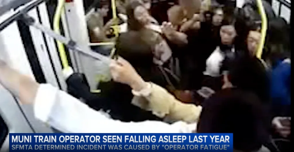 Video still of a Muni operator apparently falling asleep before two empty trains collided.