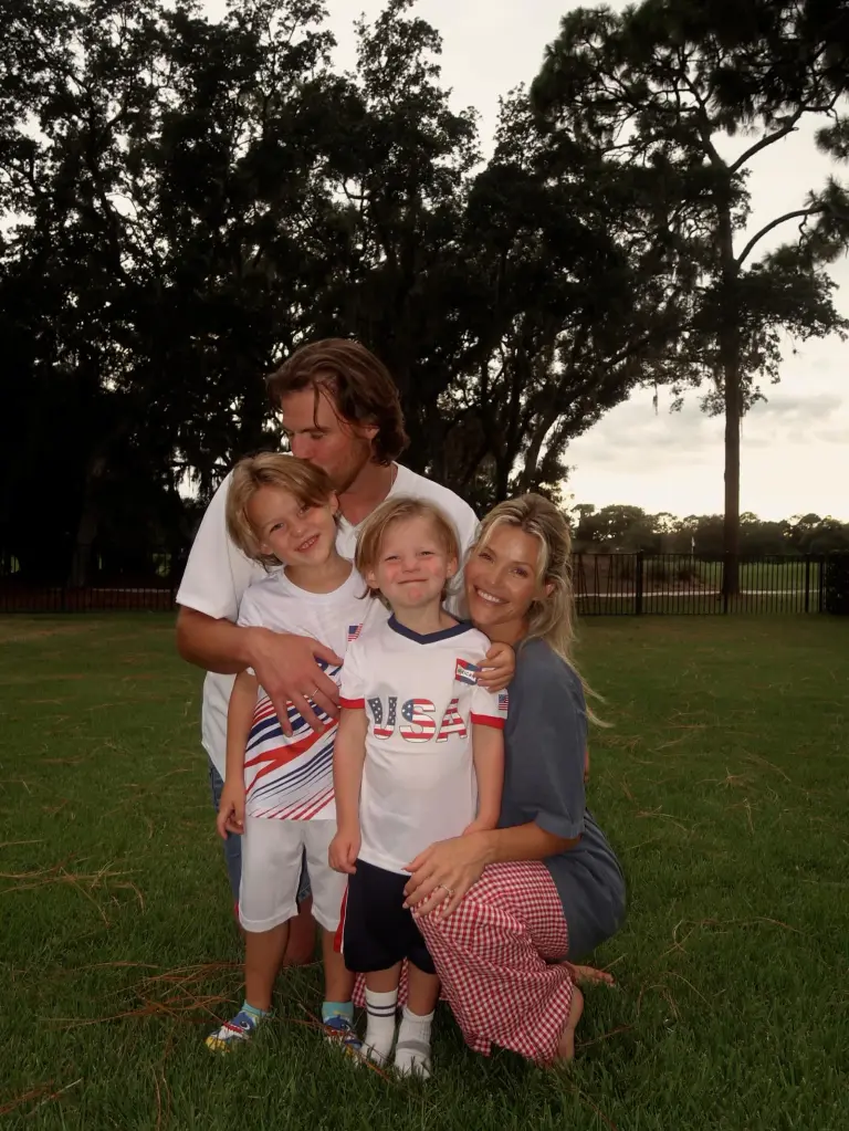 Witney Carson with her family, including her husband and two sons.