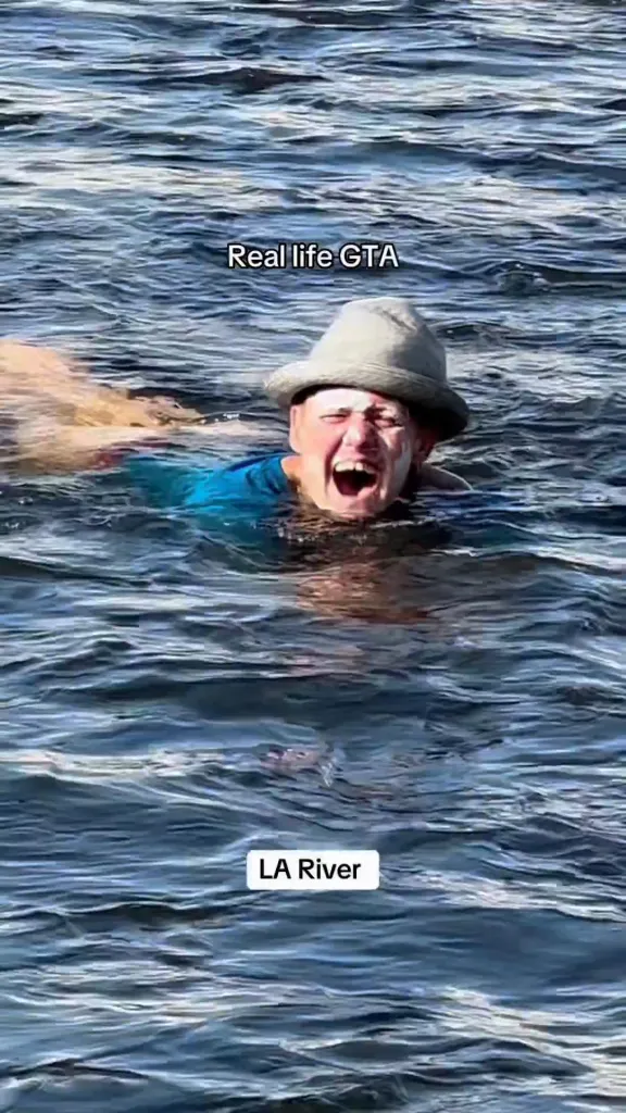 A woman floating in the Los Angeles River.