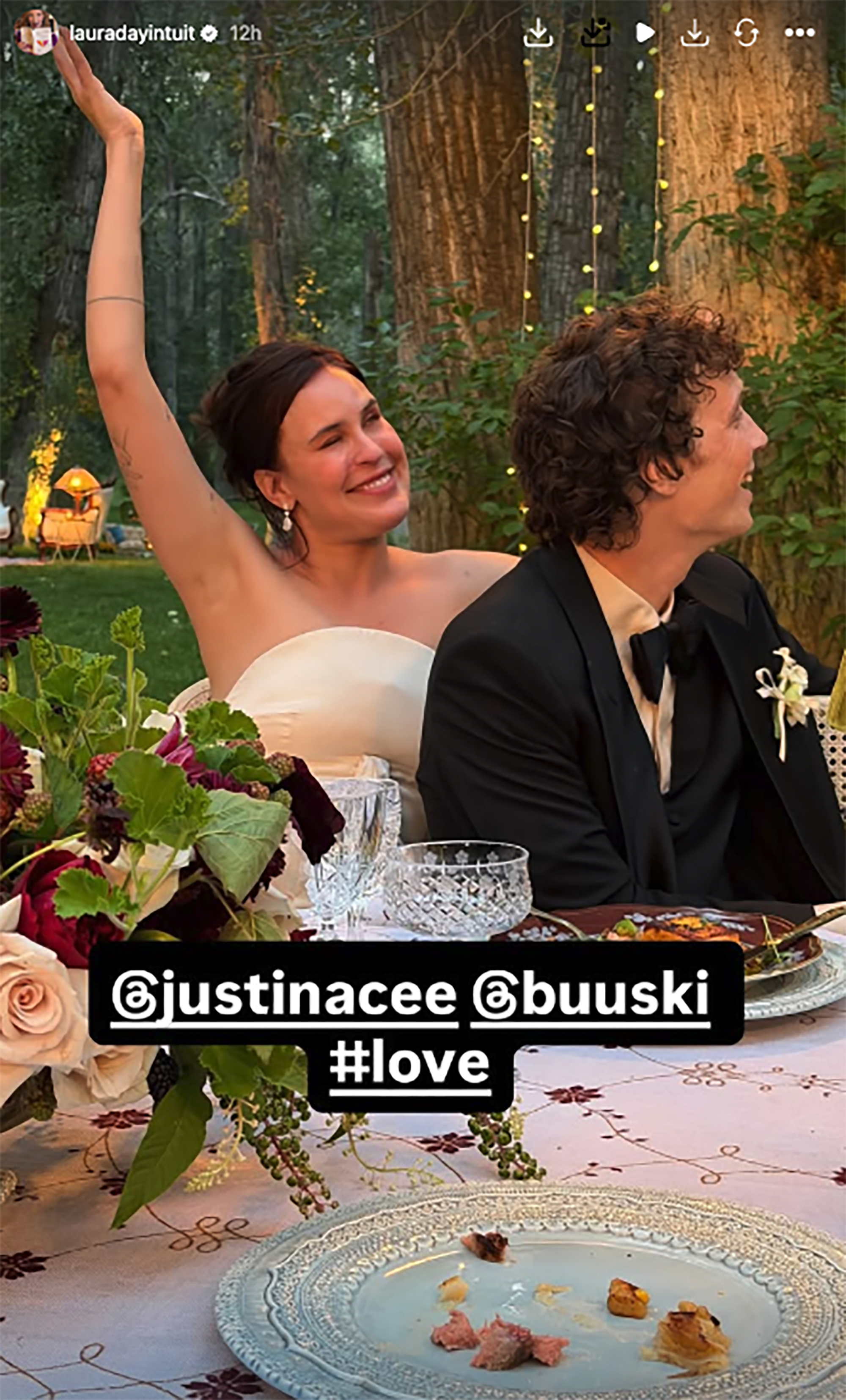 Tallulah Willis celebrating with a guest at a wedding reception.