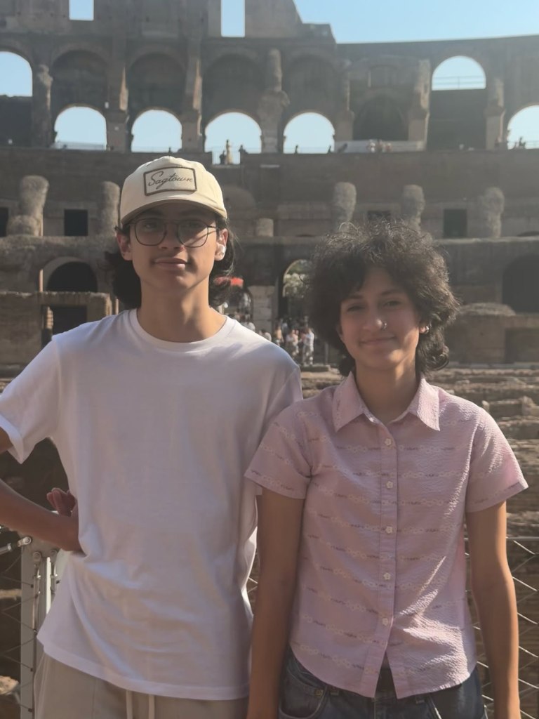 Jennifer Lopez's twins Emme and Max Muñiz posing at the Colosseum in Rome.