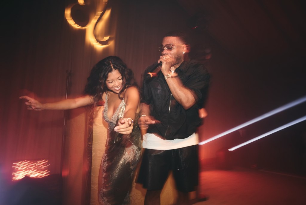 Jen Rubio dancing with Nelly during her birthday party.