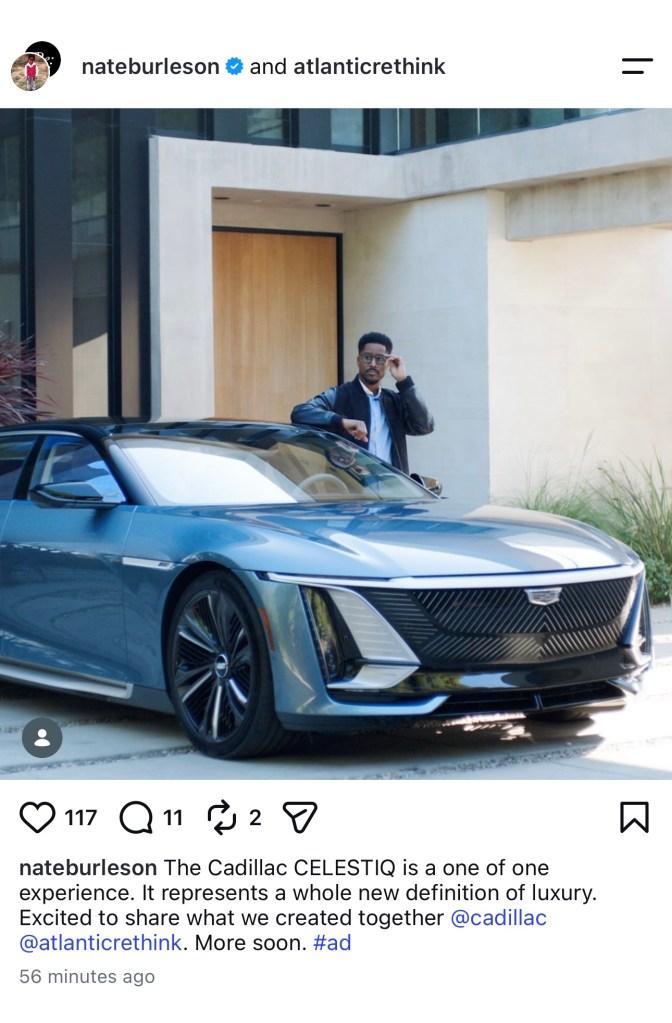 Nate Burleson posing with a Cadillac Celestiq in an advertisement.