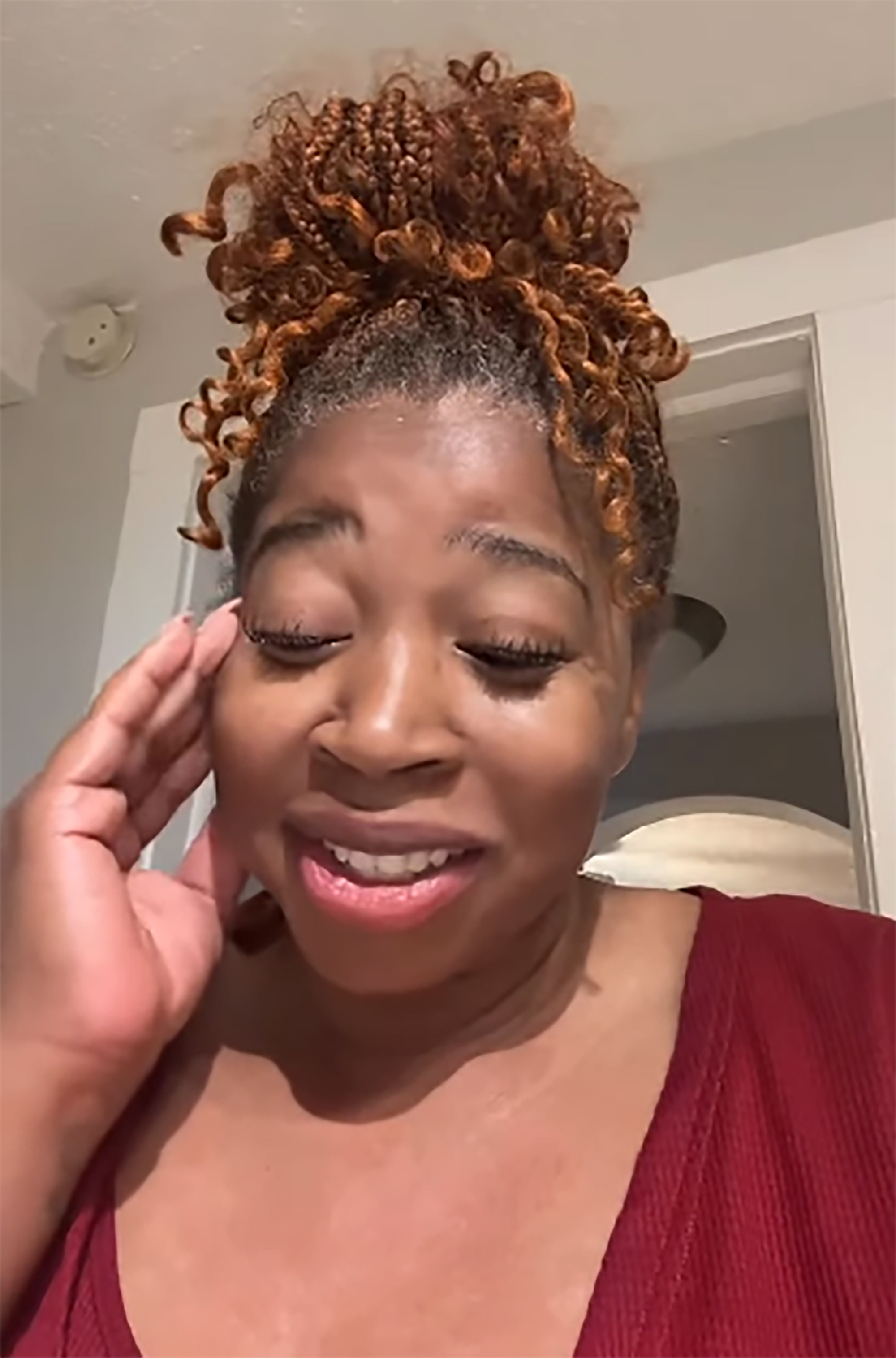 Giovonnie Samuels with her hair in a high bun.