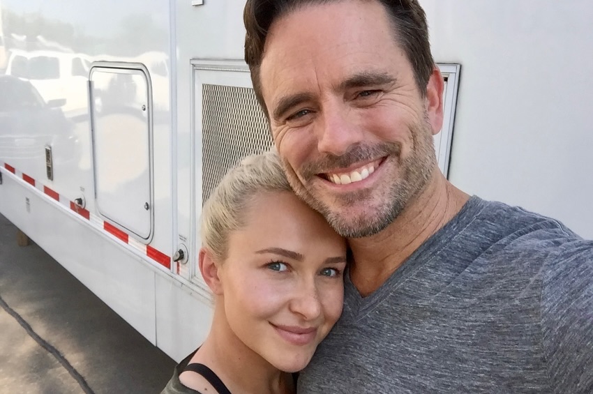 Hayden Panettiere and Charles Esten smiling together.