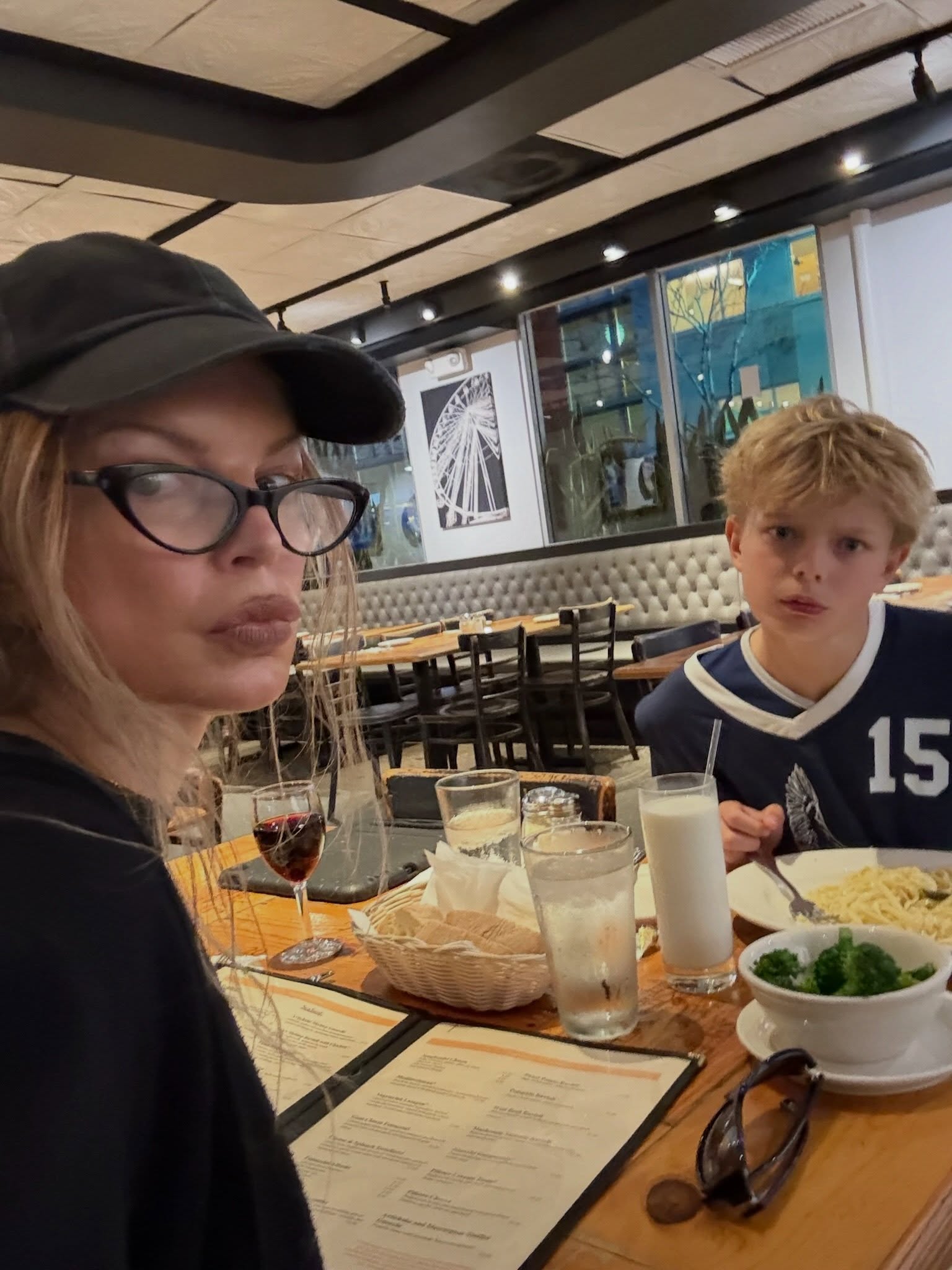 Fergie and her son Axl at a restaurant.