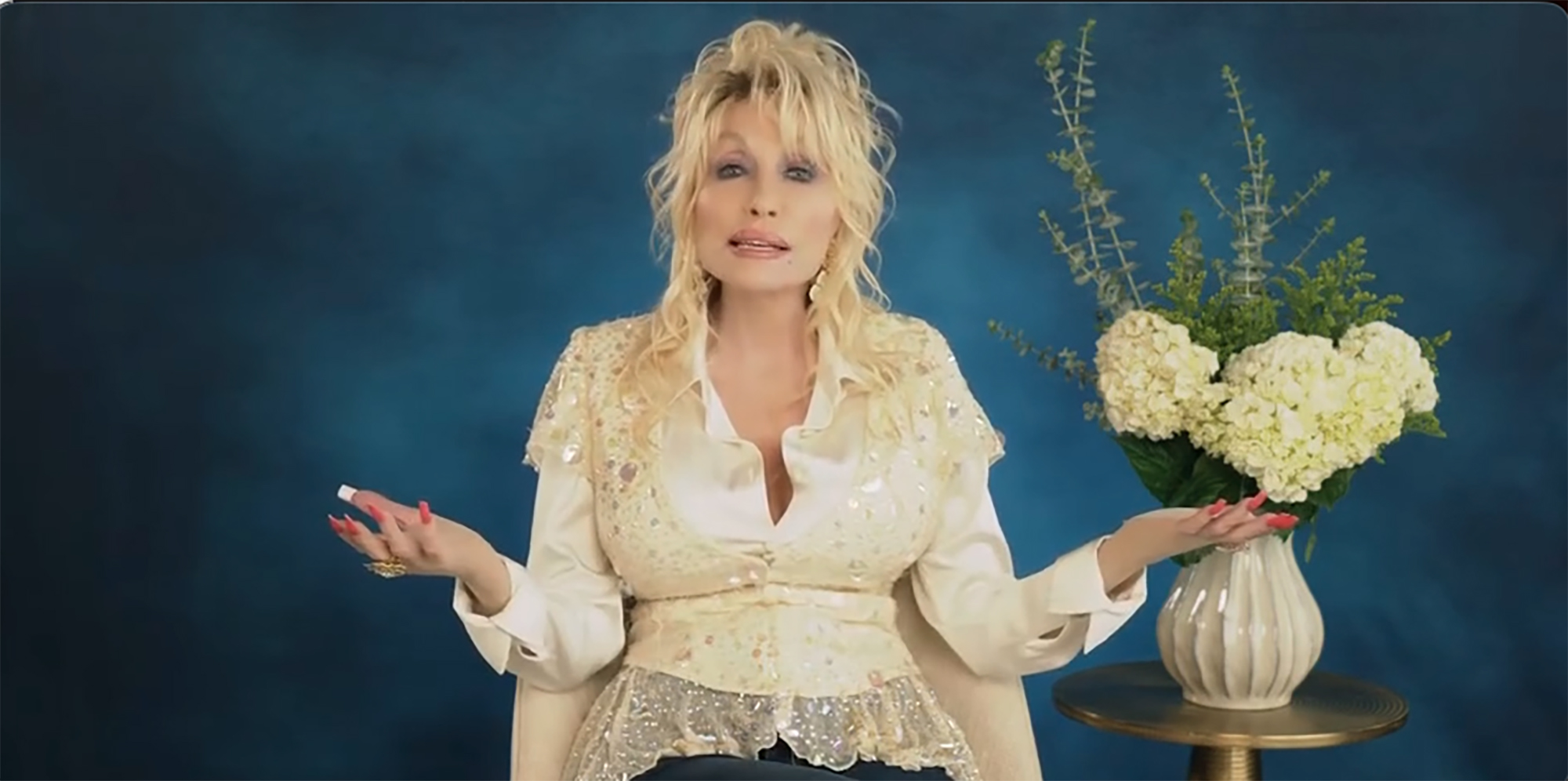 Dolly Parton accepts an ACM award.