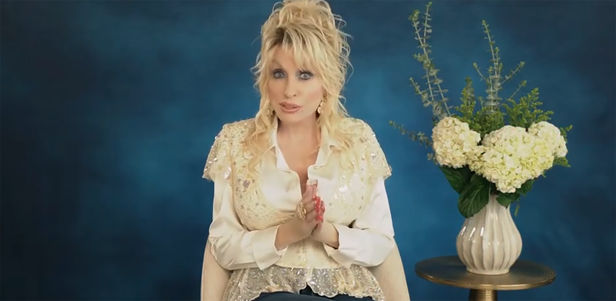 Dolly Parton accepting an award at the ACM.
