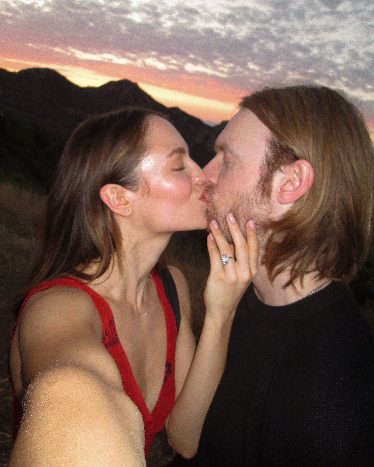 Finneas Eilish and Claudia Sulewski pose in a photo.