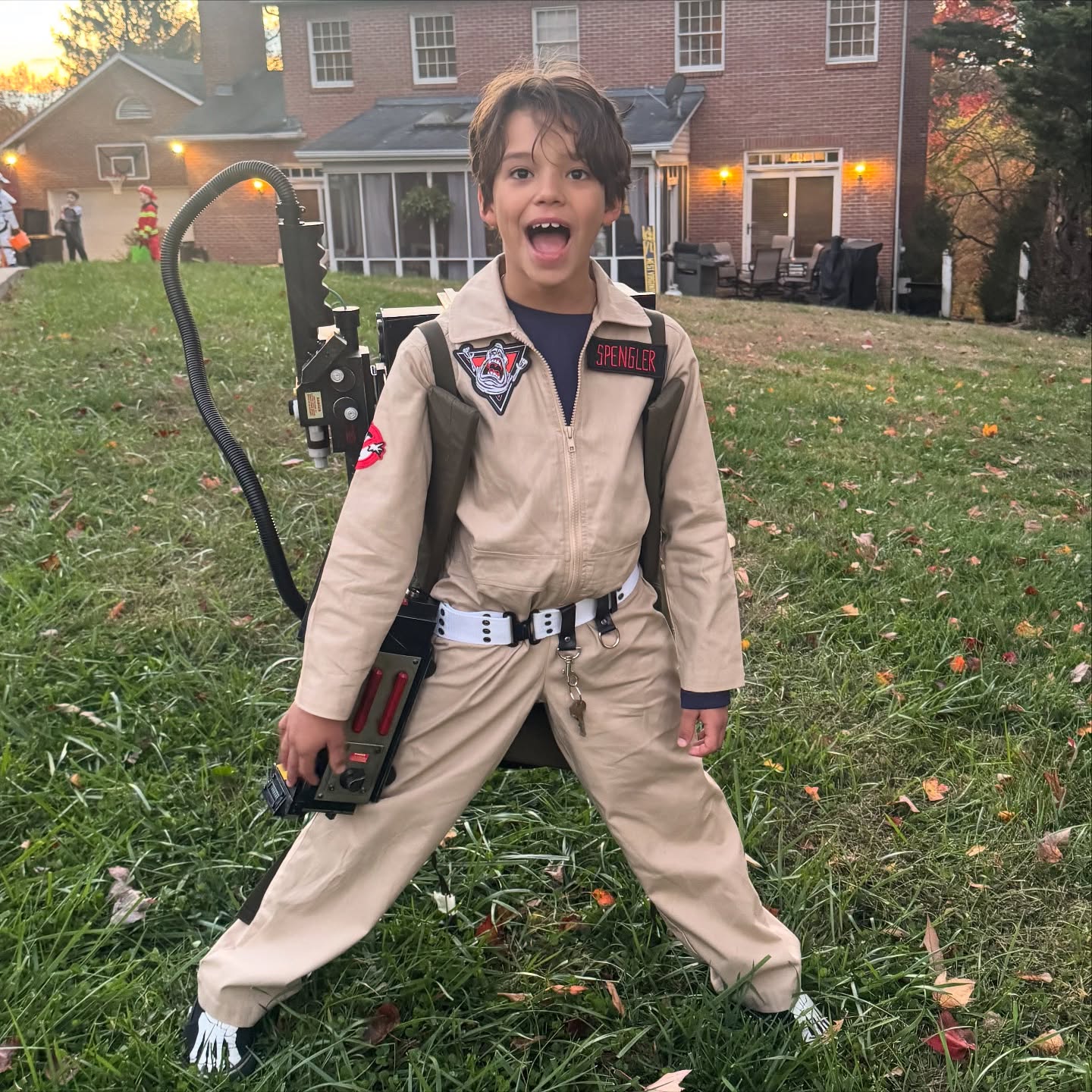 Josey Dorsey in a Ghostbusters costume with a 