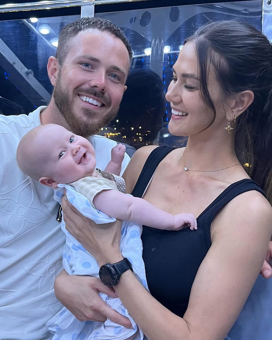 Nathan Gallagher and Gael Cameron holding their baby.