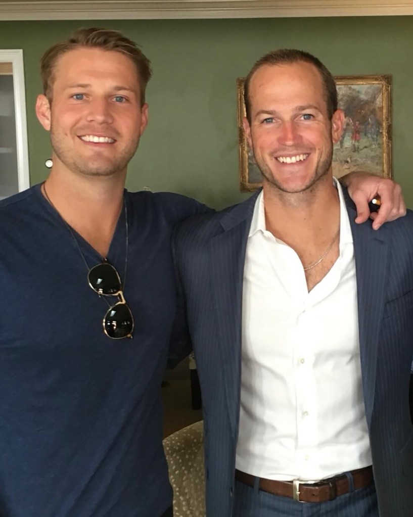 Brian Hickerson and Zach smiling at the camera, with Brian's arm around Zach.