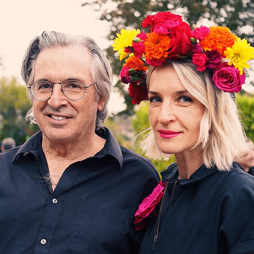 Robert and Ever Carradine pose for a photo.