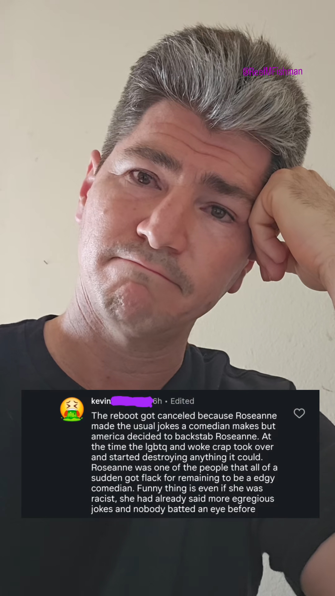Michael Fishman looking sad and disappointed with a comment about Roseanne Barr.