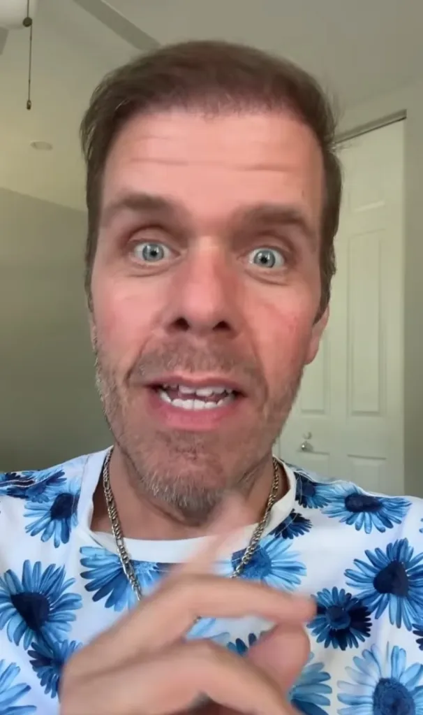 Perez Hilton with wide eyes and open mouth.