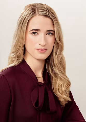 Avital Balwit looking at the camera.