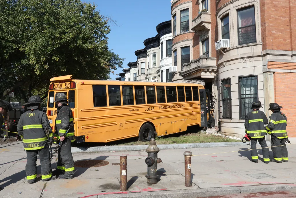 The school bus driver slammed into the Eastern Parkway building around 7:20 a.m. Thursday, police said.