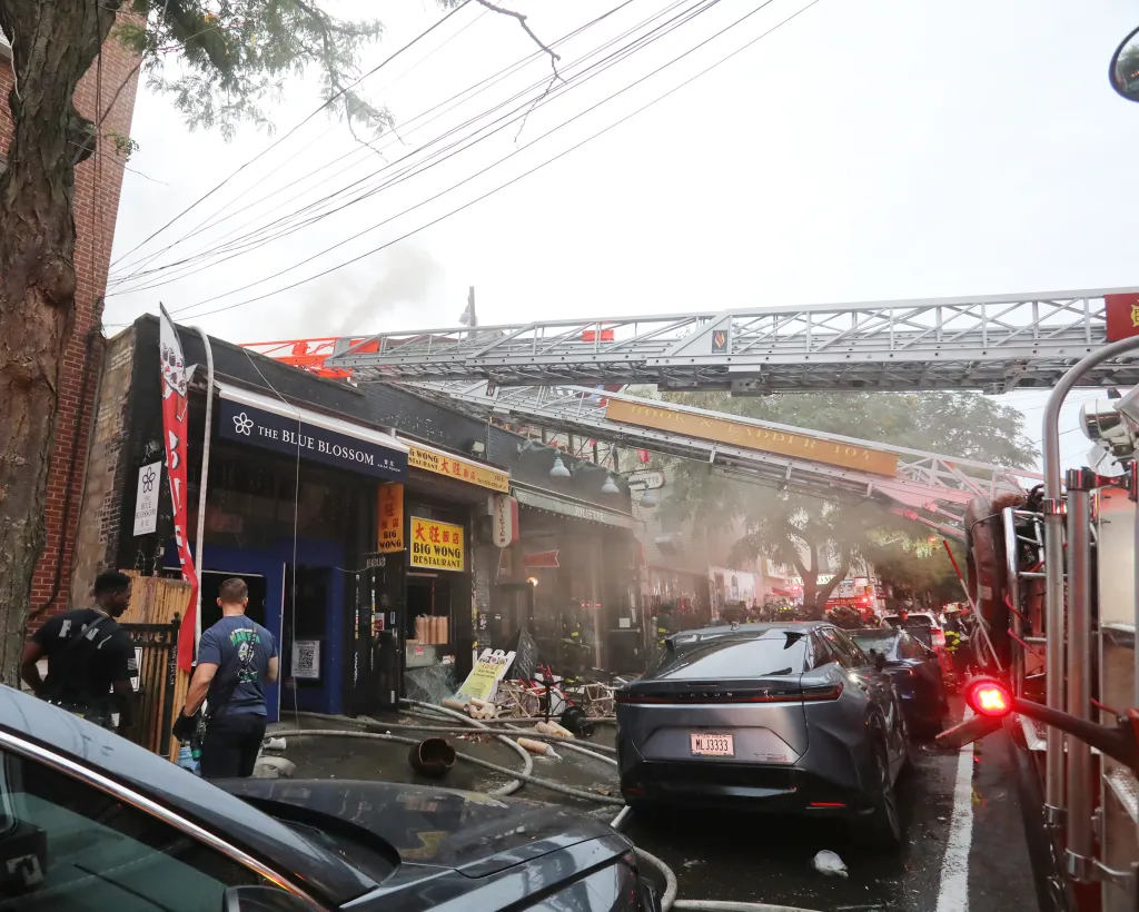 Firefighters battle a fire at 