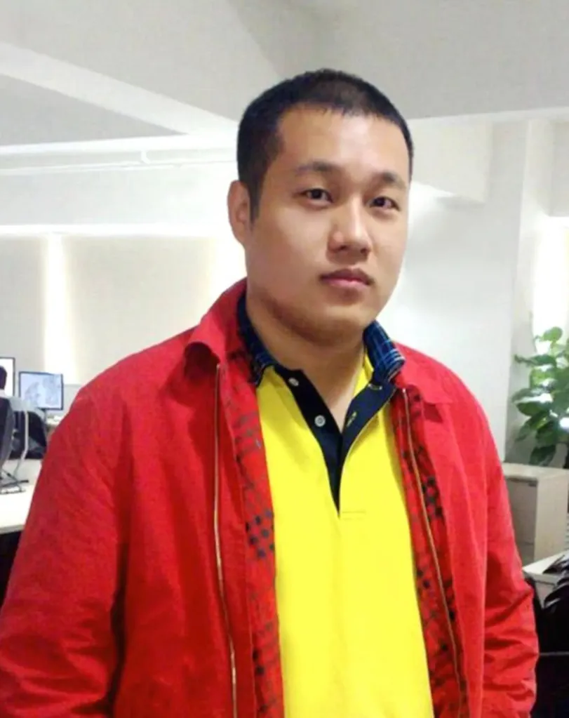 Xu Bo, a Chinese billionaire, looks directly at the camera.