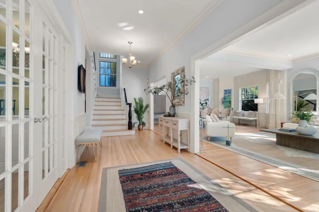 The home opens up to offer more living/dining/entertaining options.