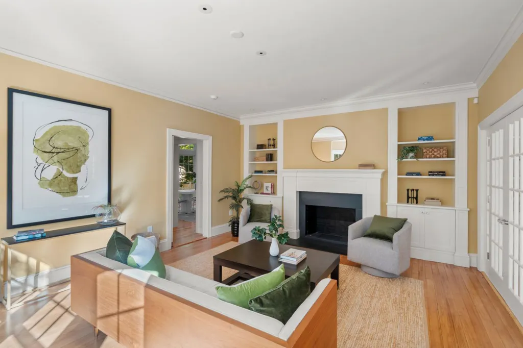 A lovely entertaining room with one of the home's four fireplaces.