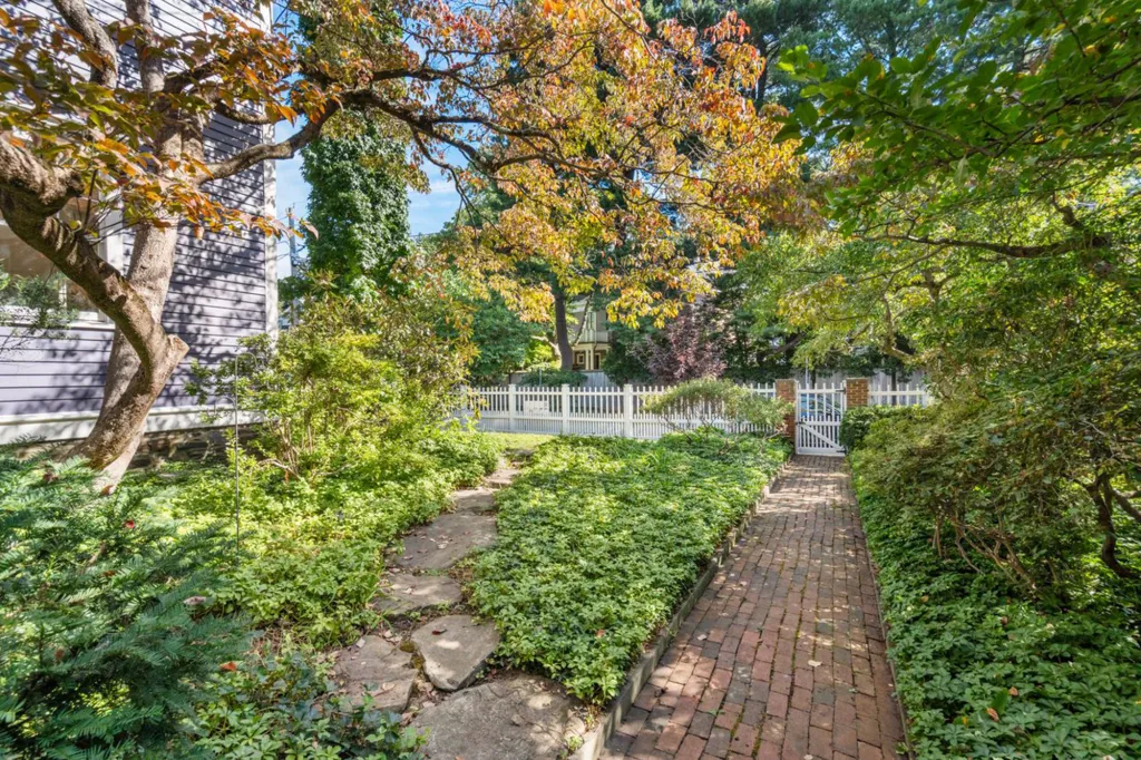 The irrigated, landscaped garden comes with mature trees.