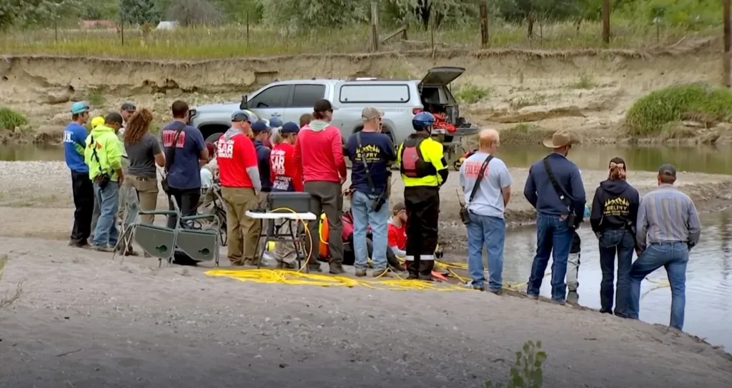 Search and rescue teams gathered on the bank of the Clarks Fork River.