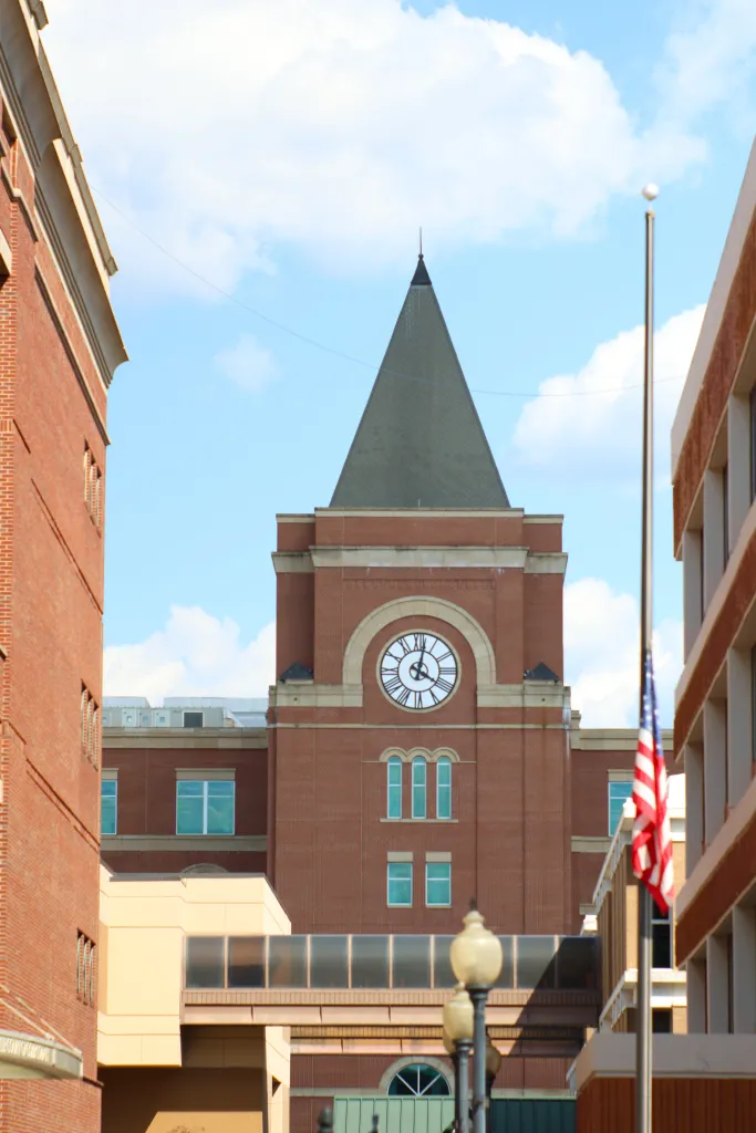 Cobb County Courthouse with a green steeple and a clock, Marietta, Georgia.