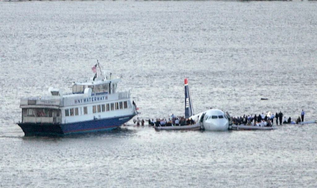 A ferry rescuing passengers from the wings of a U.S. Airways plane in the Hudson River.