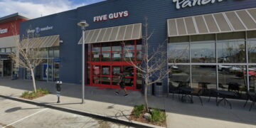 Teenage Five Guys worker hit by stray bullet while on the job