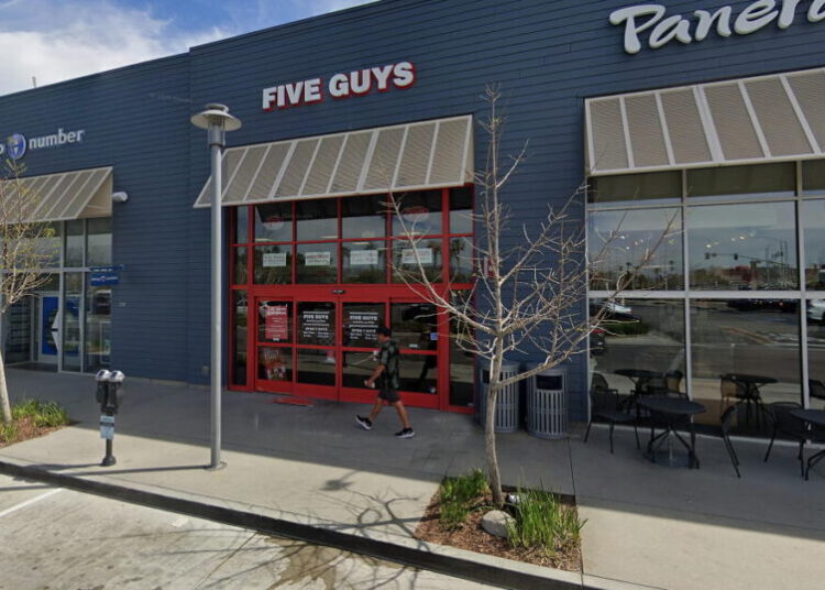 Teenage Five Guys worker hit by stray bullet while on the job