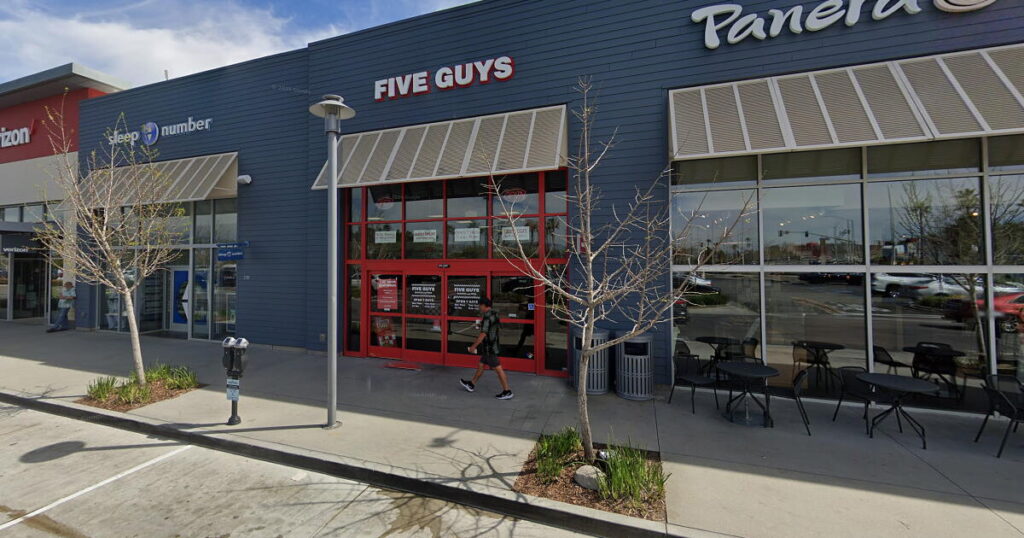 Teenage Five Guys worker hit by stray bullet while on the job