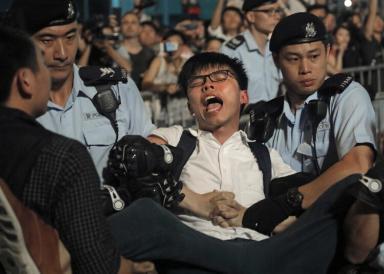 As a teen, he led Hong Kong protests. China is still punishing him.
